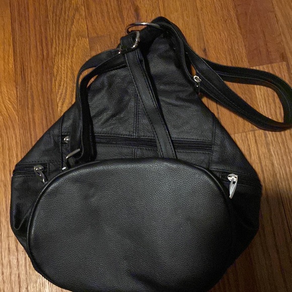 Never been used! Black leather multi usage bag. Can wear as a backpack or purse - Picture 3 of 3